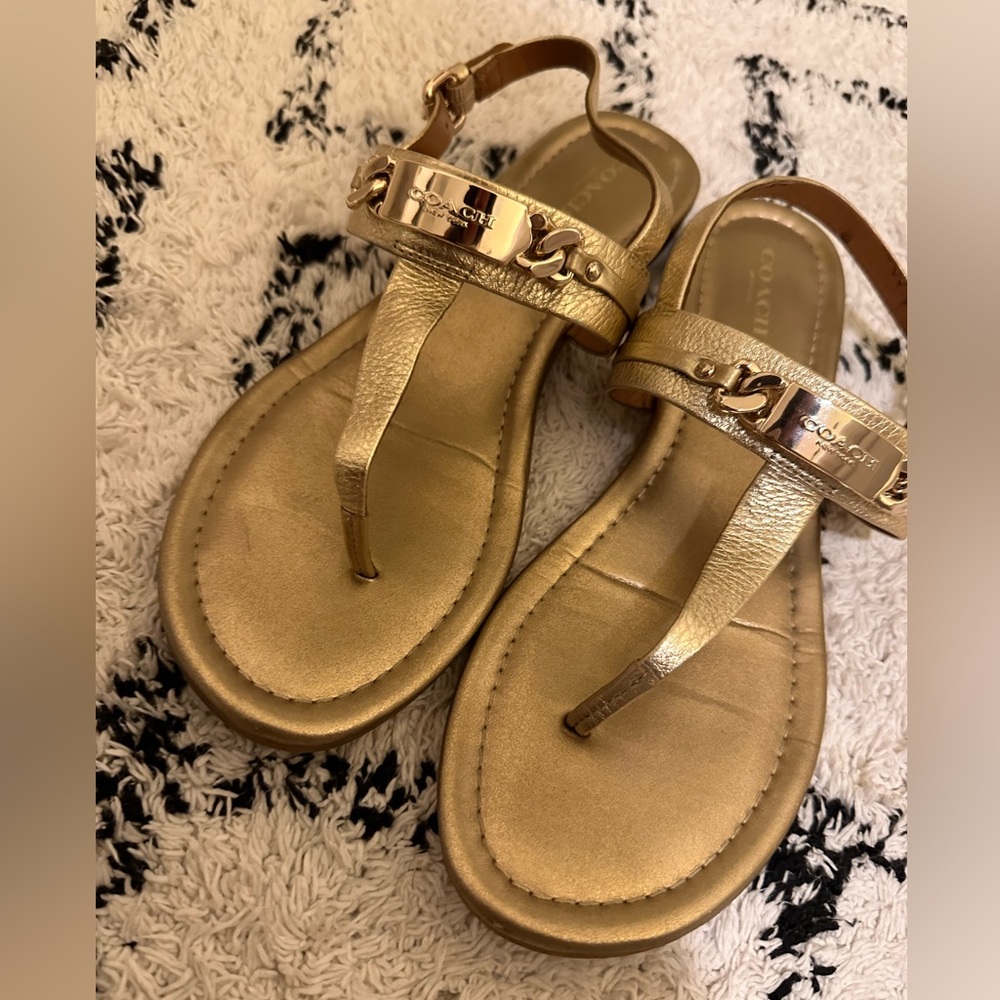 Gold Coach almost new sandals.
